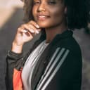 Portrait of a smiling woman in a dark jacket
